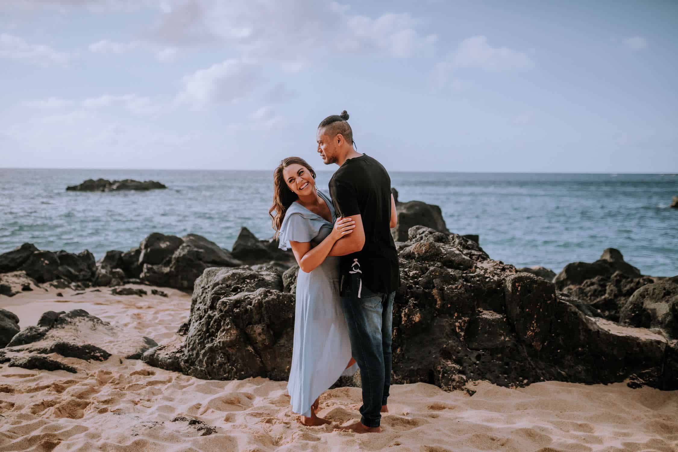 Engagement session on the coast of Oahu, Hawaii at Waimea Bay by Anela Benavides