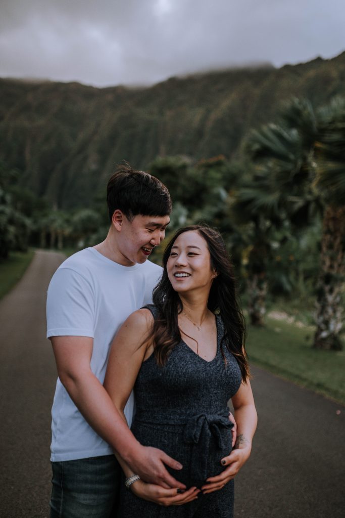 maternity session with mom and dad to be at Ho'omaluhia Botanical Gardens + Kualoa Beach | Anela Benavides