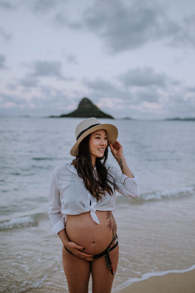 maternity session with mom and dad to be at Ho'omaluhia Botanical Gardens + Kualoa Beach | Anela Benavides