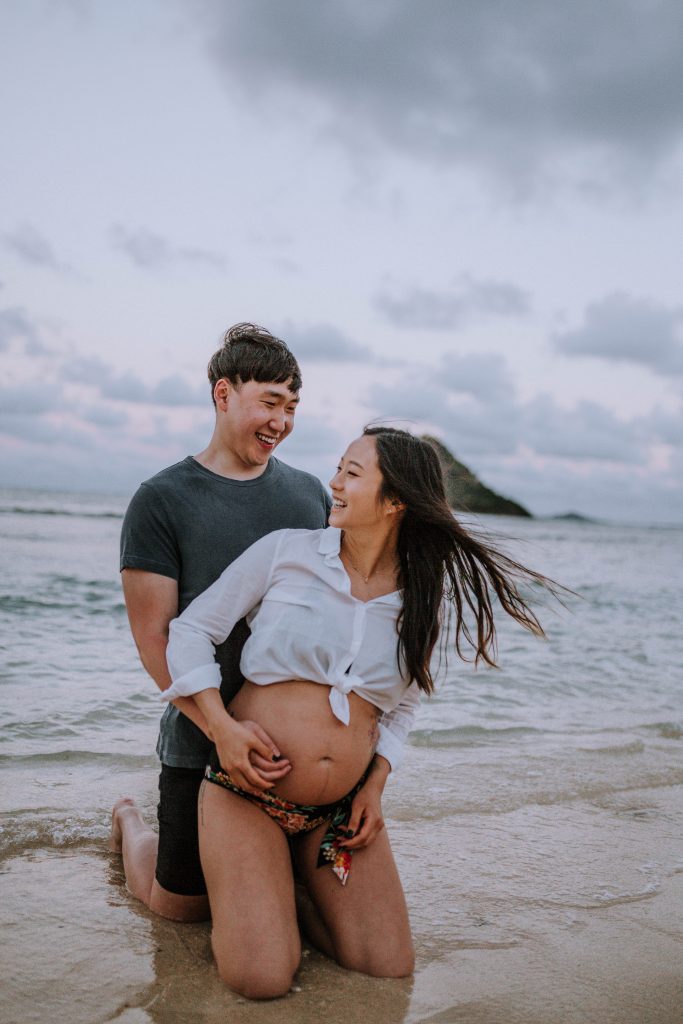 maternity session with mom and dad to be at Ho'omaluhia Botanical Gardens + Kualoa Beach | Anela Benavides