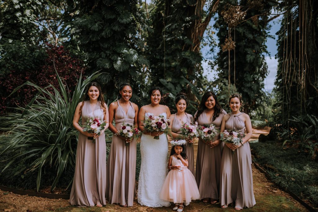 bridal party with pink bridesmaid dresses