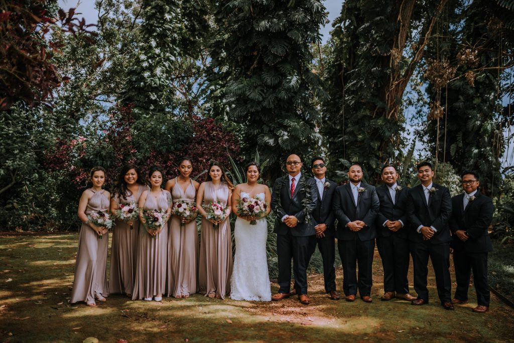 bridal party with pink bridesmaid dresses