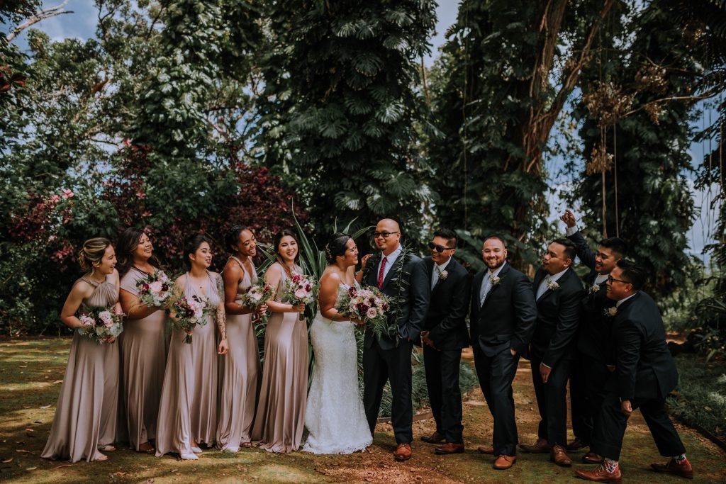bridal party with pink bridesmaid dresses