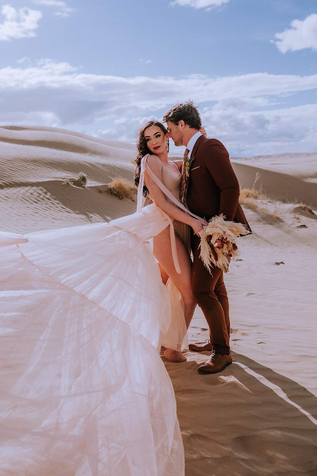 adventurous chic destination sand dune elopement in Utah destination wedding photographer